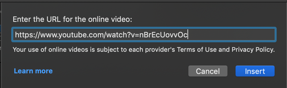 close-up of a URL typed into the insert video box in PowerPoint