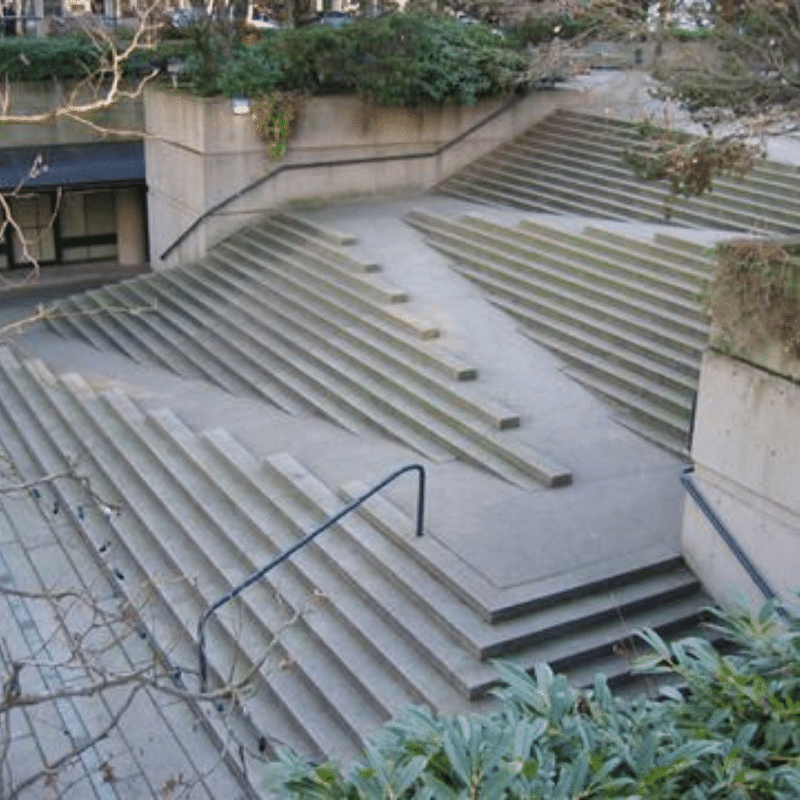 an aerial photograph of an outdoor stairway with ramps and rails infused