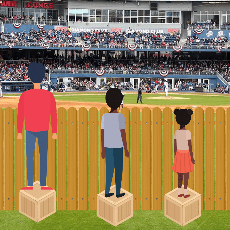 3 people stand on wooden crates and watch a baseball game over a wooden fence