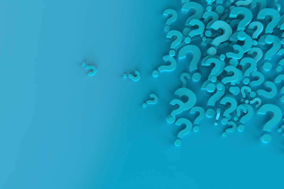 teal background with a large number of three-dimensional question marks in the upper right corner