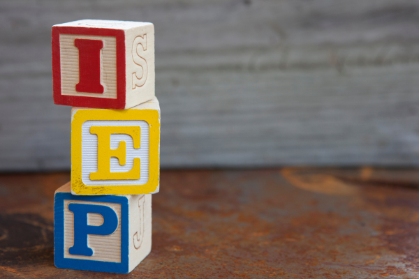 children's building blocks stacked to spell IEP