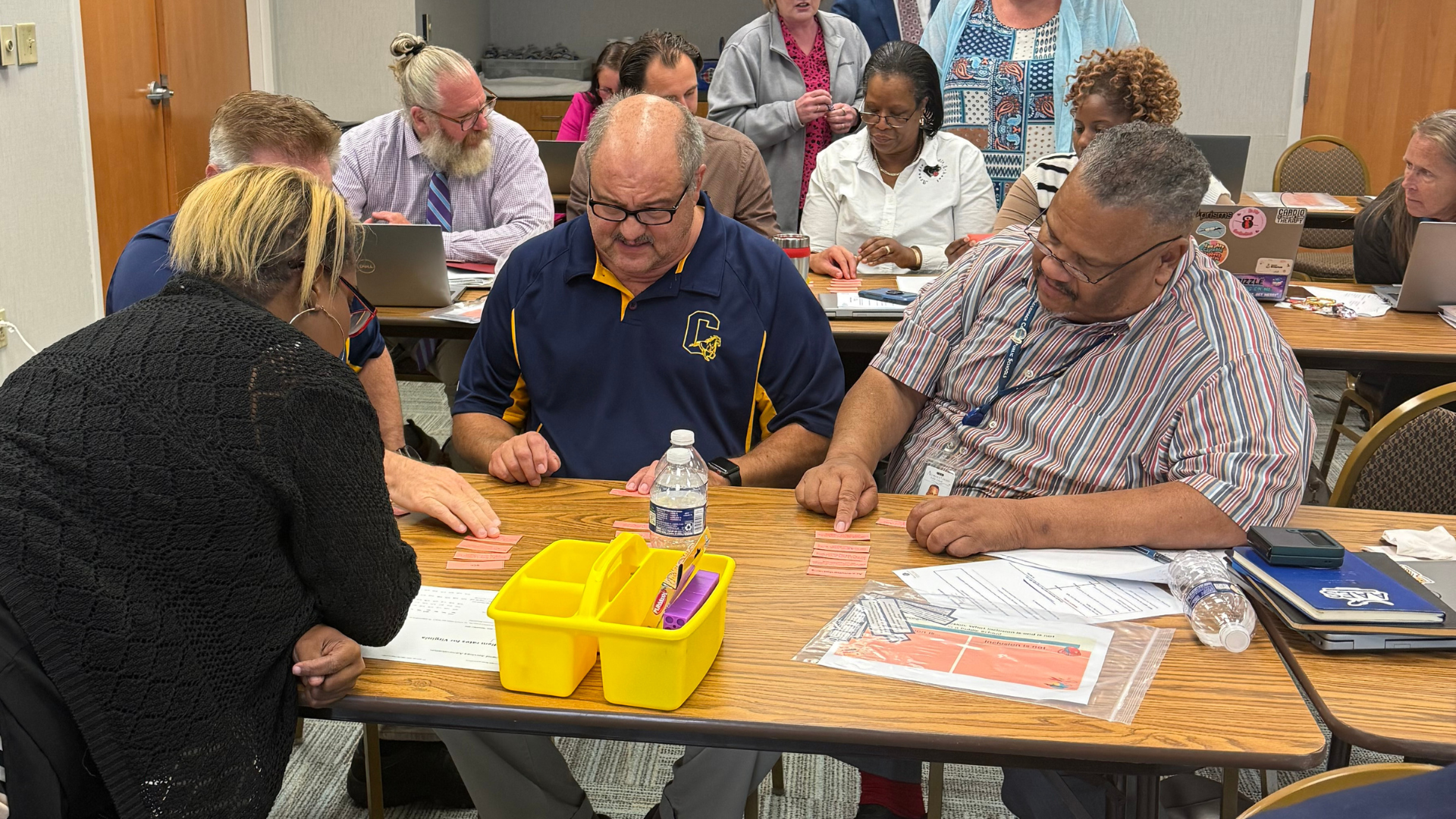 teachers collaborating around a table