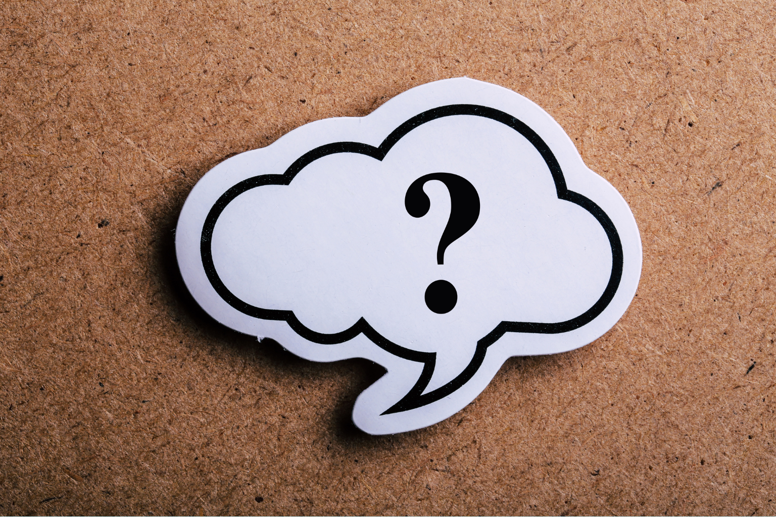 question mark inside a speech bubble